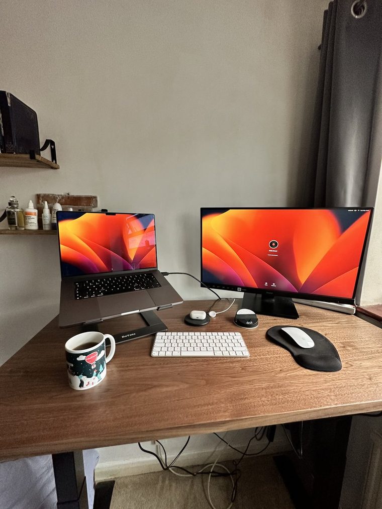 My desk with the MiniDeed mug on it.